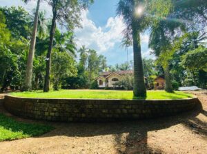 well-cultivated land with Walawwa-style house for sale in Nittambuwa